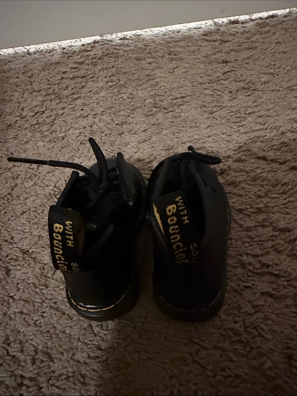 Dr. Martens toddler Black Lace-Up Boots with Yellow Trim